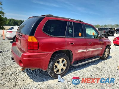 Trzecie zdjęcie samochodu z tyłu: 2002 GMC ENVOY VIN:1GKDS13S222452817 - miniatura