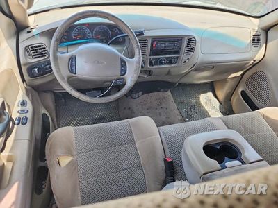 Zdjęcie 8 z 12 samochodu: 2002 FORD F150 VIN:1FTRX18L02NB60389 - miniatura