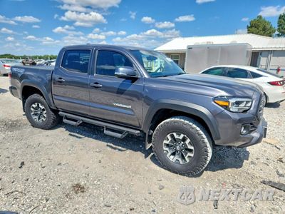 Czwarte zdjęcie samochodu z boku: 2023 TOYOTA TACOMA TRD OFF-ROAD VIN:3TYCZ5AN0PT162782 - miniatura