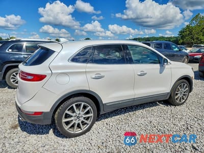 Trzecie zdjęcie samochodu z tyłu: 2019 LINCOLN MKC RESERVE VIN:5LMCJ3C92KUL03775 - miniatura