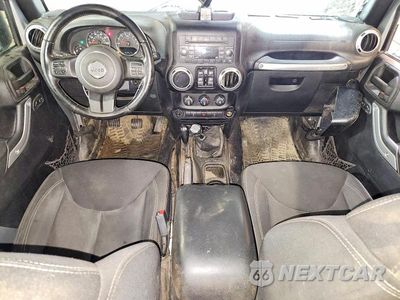 Zdjęcie 8 z 14 samochodu: 2016 JEEP WRANGLER UNLIMITED SAHARA VIN:1C4BJWEG1GL103791 - miniatura