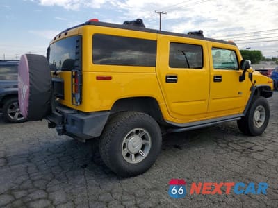 Trzecie zdjęcie samochodu z tyłu: 2003 HUMMER H2 VIN:5GRGN23U93H121690 - miniatura
