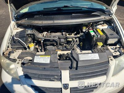 Zdjęcie 11 z 12 samochodu: 2005 DODGE GRAND CARAVAN SXT VIN:2D8GP44LX5R262970 - miniatura