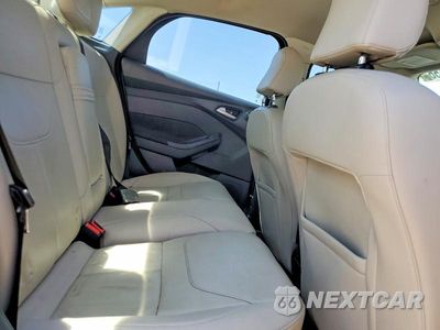 Zdjęcie 10 z 12 samochodu: 2015 FORD FOCUS TITANIUM VIN:1FADP3J23FL328041 - miniatura