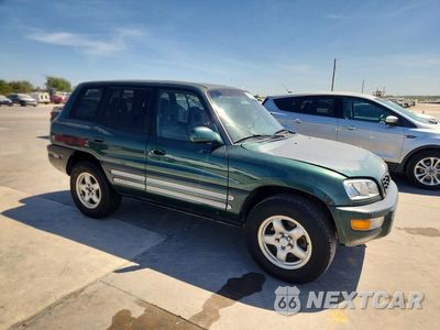 Czwarte zdjęcie samochodu z boku: 1999 TOYOTA RAV4 BASE VIN:JT3GP10V9X7059940 - miniatura