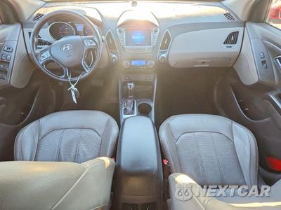 Zdjęcie 8 z 12 samochodu: 2014 HYUNDAI TUCSON LIMITED VIN:KM8JUCAG3EU798298 - miniatura