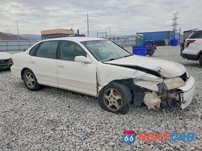 Czwarte zdjęcie samochodu z boku: 1999 TOYOTA AVALON XL VIN:4T1BF18B7XU327058 - miniatura