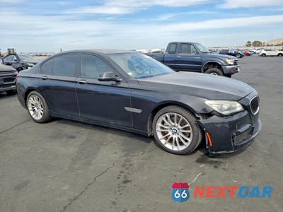 Czwarte zdjęcie samochodu z boku: 2015 BMW 740 I VIN:WBAYA6C51FD827028 - miniatura