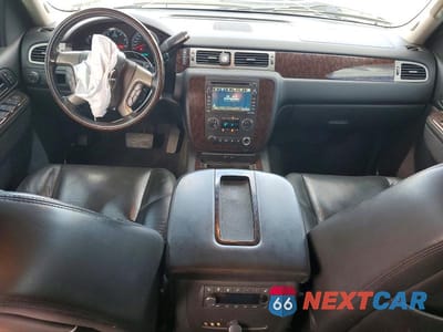 Zdjęcie 8 z 13 samochodu: 2011 GMC YUKON DENALI VIN:1GKS2MEF0BR394528 - miniatura