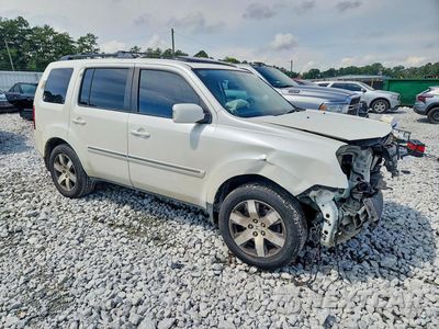 Czwarte zdjęcie samochodu z boku: 2014 HONDA PILOT TOURING VIN:5FNYF3H91EB025584 - miniatura