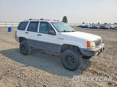 Czwarte zdjęcie samochodu z boku: 1995 JEEP GRAND CHEROKEE LAREDO VIN:1J4GZ58S9SC719038 - miniatura