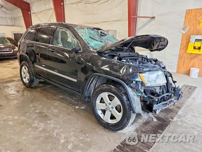 Czwarte zdjęcie samochodu z boku: 2013 JEEP GRAND CHEROKEE LAREDO VIN:1C4RJFAG0DC592099 - miniatura