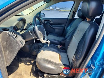 Zdjęcie 7 z 12 samochodu: 2007 FORD FOCUS ZX5 VIN:1FAFP37N47W307113 - miniatura