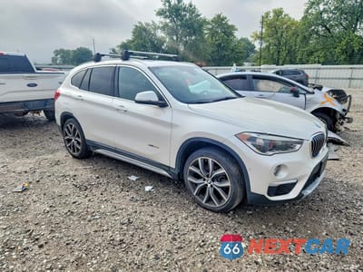 Czwarte zdjęcie samochodu z boku: 2016 BMW X1 XDRIVE28I VIN:WBXHT3C36GP881907 - miniatura