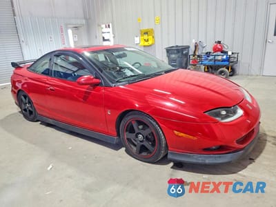 Czwarte zdjęcie samochodu z boku: 2002 SATURN SC2 VIN:1G8ZR12762Z282635 - miniatura