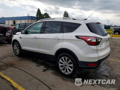 Drugie zdjęcie samochodu z przodu: 2017 FORD ESCAPE TITANIUM VIN:1FMCU0JD9HUD74660 - miniatura