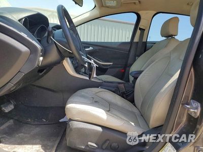 Zdjęcie 7 z 12 samochodu: 2015 FORD FOCUS TITANIUM VIN:1FADP3J23FL328041 - miniatura