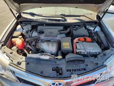 Zdjęcie 11 z 12 samochodu: 2012 TOYOTA CAMRY HYBRID XLE VIN:4T1BD1FK2CU043713 - miniatura