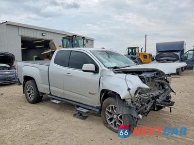 Czwarte zdjęcie samochodu z boku: 2018 GMC CANYON SLE VIN:1GTH6CEN3J1228674 - miniatura