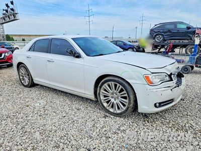 Czwarte zdjęcie samochodu z boku: 2014 CHRYSLER 300C VIN:2C3CCAEG1EH161903 - miniatura