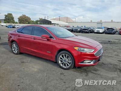 Czwarte zdjęcie samochodu z boku: 2017 FORD FUSION TITANIUM PHEV VIN:3FA6P0SUXHR354616 - miniatura