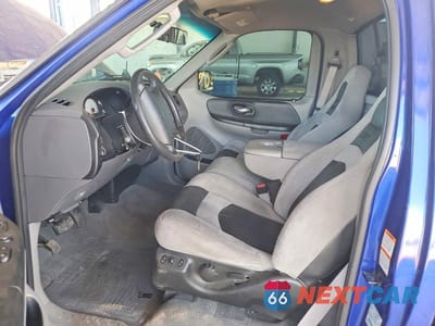 Zdjęcie 7 z 13 samochodu: 2004 FORD F150 SVT LIGHTNING VIN:2FTRF07334CA49262 - miniatura