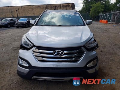 Piąte zdjęcie samochodu w środku: 2014 HYUNDAI SANTA FE SPORT 2.0T VIN:5XYZWDLA2EG166443 - miniatura