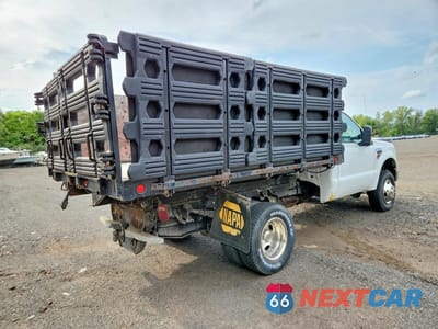 Trzecie zdjęcie samochodu z tyłu: 2010 FORD F350 SUPER DUTY VIN:1FDWF3HR0AEB26663 - miniatura