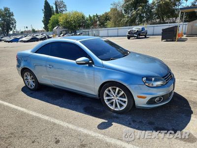 Czwarte zdjęcie samochodu z boku: 2013 VOLKSWAGEN EOS KOMFORT VIN:WVWBW8AH8DV002730 - miniatura