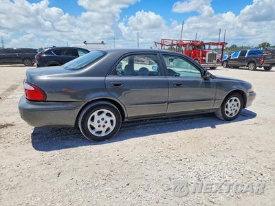 Trzecie zdjęcie samochodu z tyłu: 2000 MAZDA 626 ES VIN:1YVGF22C5Y5147147 - miniatura