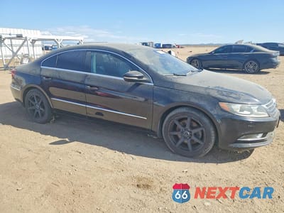 Czwarte zdjęcie samochodu z boku: 2014 VOLKSWAGEN CC SPORT VIN:WVWBP7AN3EE527077 - miniatura