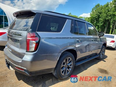 Trzecie zdjęcie samochodu z tyłu: 2022 CHEVROLET TAHOE K1500 Z71 VIN:1GNSKPKD5NR162034 - miniatura