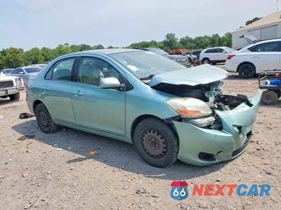 Czwarte zdjęcie samochodu z boku: 2009 TOYOTA YARIS BASE VIN:JTDBT903994047452 - miniatura