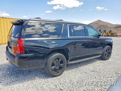 Trzecie zdjęcie samochodu z tyłu: 2018 CHEVROLET SUBRBAN VIN:1GNSKHKCXJR105982 - miniatura
