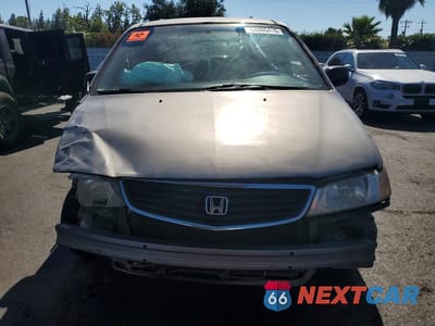 Piąte zdjęcie samochodu w środku: 2000 HONDA ODYSSEY LX VIN:2HKRL1859YH562773 - miniatura