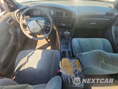 Zdjęcie 8 z 12 samochodu: 1992 TOYOTA CAMRY LE VIN:4T1SK12E9NU160326 - miniatura