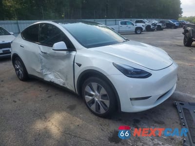Czwarte zdjęcie samochodu z boku: 2023 TESLA MODEL Y VIN:7SAYGDED8PF934942 - miniatura