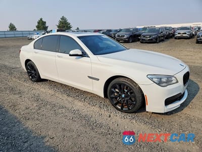 Czwarte zdjęcie samochodu z boku: 2015 BMW 750 XI VIN:WBAYB6C51FG299230 - miniatura