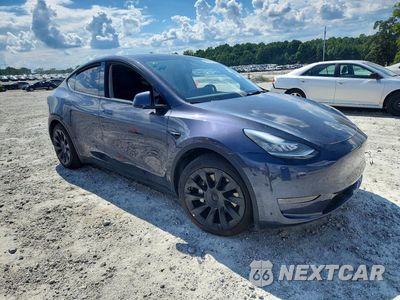 Czwarte zdjęcie samochodu z boku: 2021 TESLA MODEL Y VIN:5YJYGDEEXMF244529 - miniatura