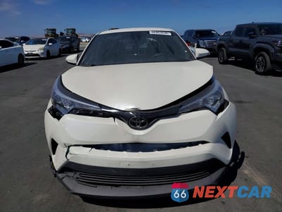 Piąte zdjęcie samochodu w środku: 2019 TOYOTA C-HR LE VIN:JTNKHMBX1K1042947 - miniatura