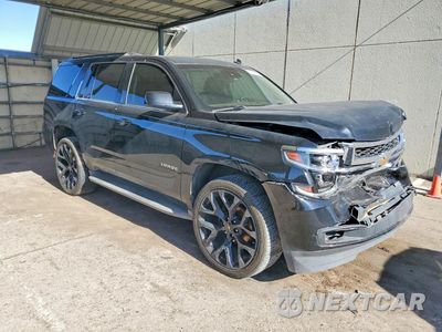 Czwarte zdjęcie samochodu z boku: 2015 CHEVROLET TAHOE C1500 LT VIN:1GNSCBKC1FR212971 - miniatura