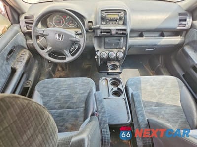 Zdjęcie 8 z 13 samochodu: 2004 HONDA CR-V LX VIN:SHSRD68404U206537 - miniatura