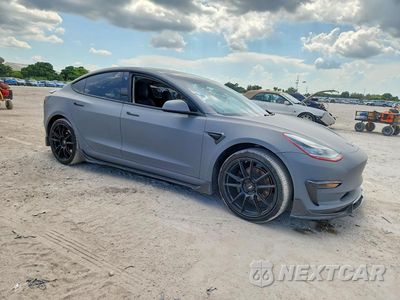 Czwarte zdjęcie samochodu z boku: 2019 TESLA MODEL 3 VIN:5YJ3E1EB2KF199880 - miniatura