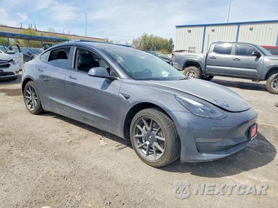 Czwarte zdjęcie samochodu z boku: 2023 TESLA MODEL 3 VIN:5YJ3E1EA2PF459094 - miniatura