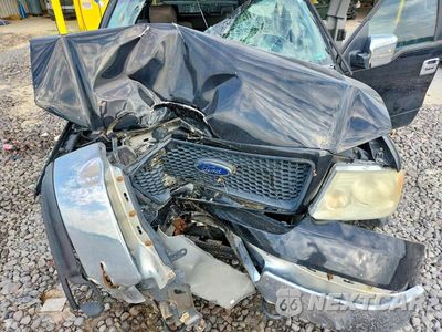 Zdjęcie 11 z 12 samochodu: 2005 FORD F150 VIN:1FTPX14525FB01440 - miniatura