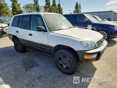 Czwarte zdjęcie samochodu z boku: 2000 TOYOTA RAV4 BASE VIN:JT3GP10V8Y0052424 - miniatura