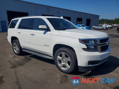 Czwarte zdjęcie samochodu z boku: 2015 CHEVROLET TAHOE C1500 LT VIN:1GNSCBKCXFR642675 - miniatura