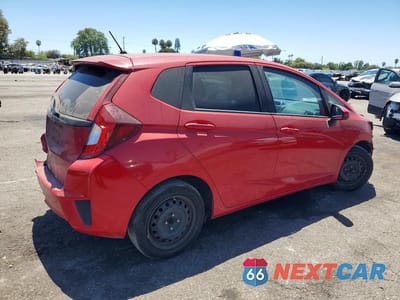 Trzecie zdjęcie samochodu z tyłu: 2016 HONDA FIT LX VIN:JHMGK5H53GS003008 - miniatura