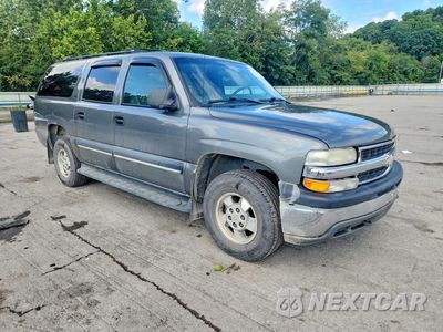 Czwarte zdjęcie samochodu z boku: 2001 CHEVROLET SUBURBAN K1500 VIN:3GNFK16T91G142394 - miniatura