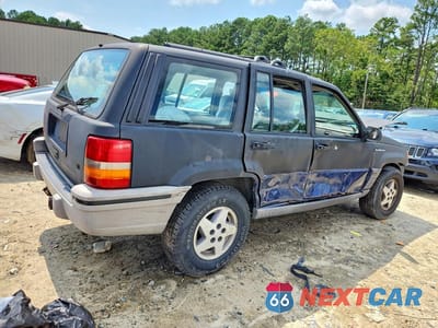 Trzecie zdjęcie samochodu z tyłu: 1993 JEEP GRAND CHEROKEE LAREDO VIN:1J4GZ58Y4PC681732 - miniatura